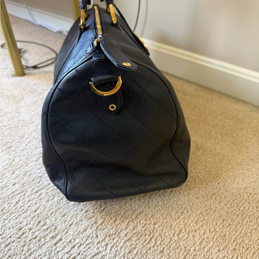 CHANEL Black Quilted Leather Travel Weekender with Gold Logo Charm - Picture 2 of 13